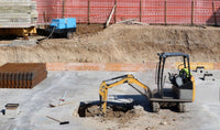 backhoe vs mini excavator